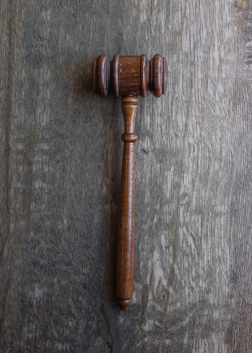 brown mallet on gray wooden surface brown mallet on gray wooden surface
