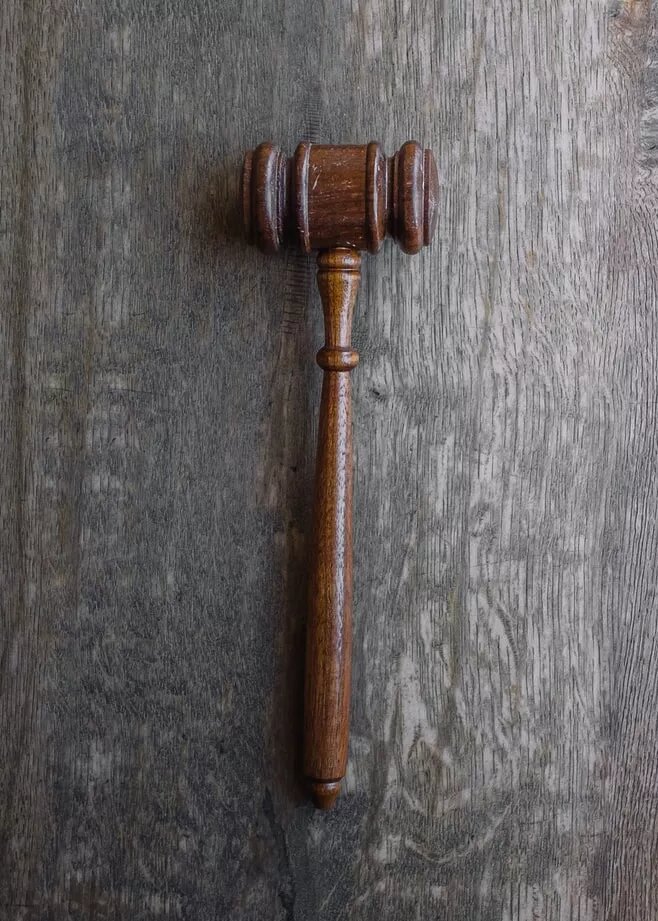 brown mallet on gray wooden surface